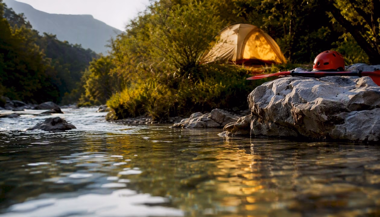 Riverside camping in Slovenia with kayaking gear