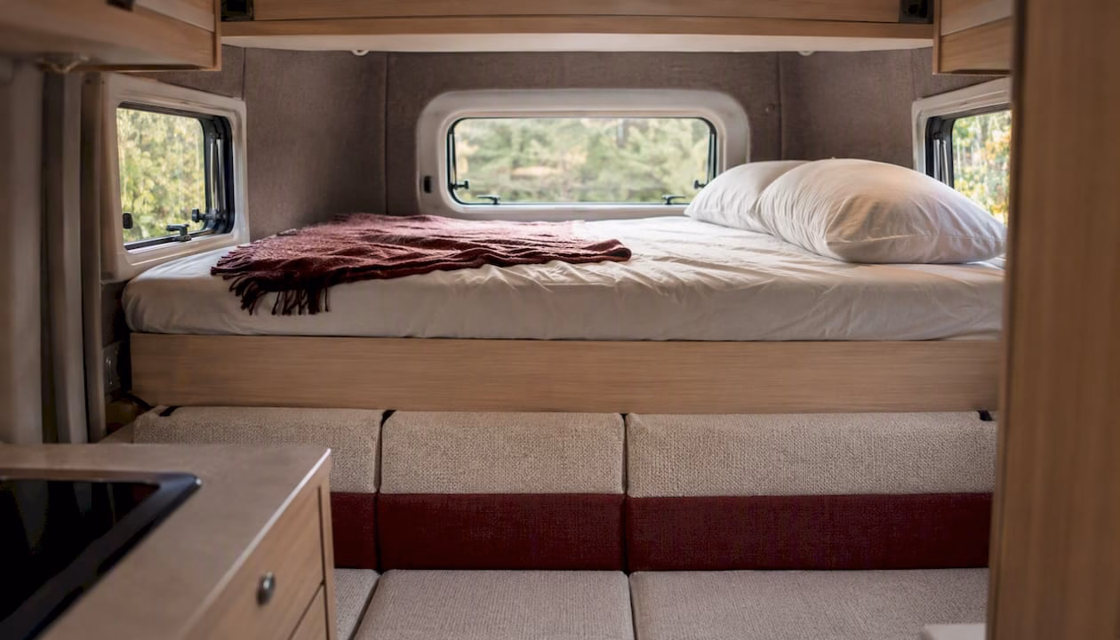 The campervan has both an upper and lower sleeping area.